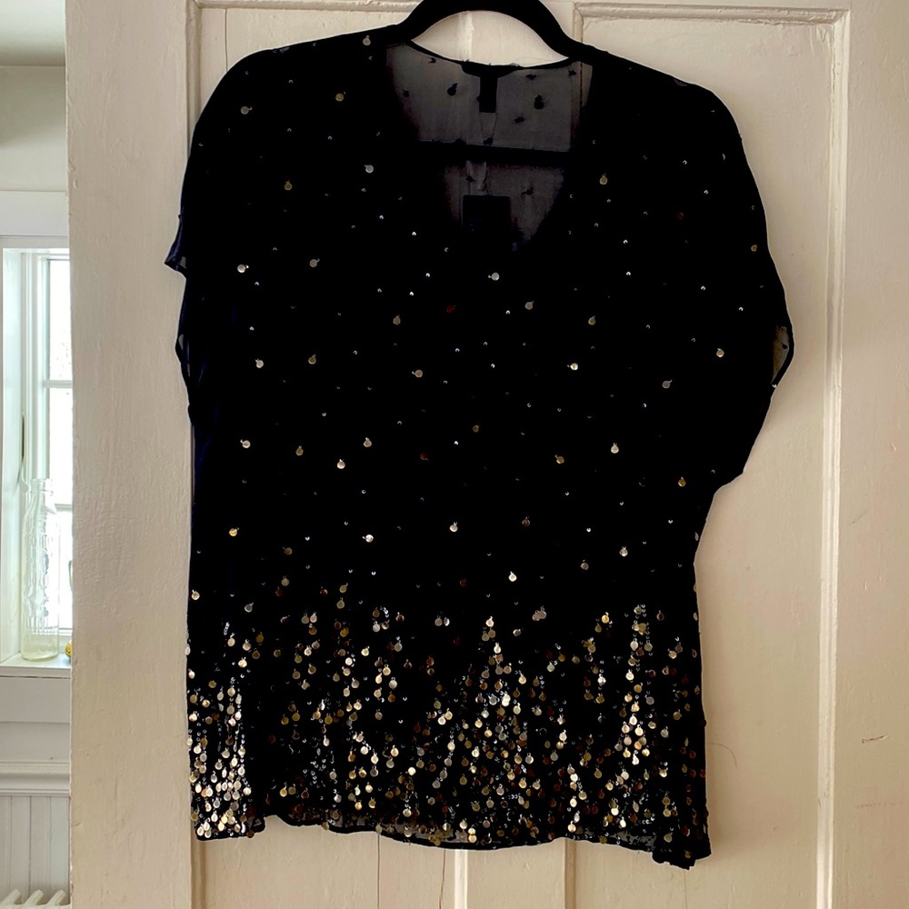 Beautiful Eileen Fisher blouse. new never worn . Black with gold metal sequins.
